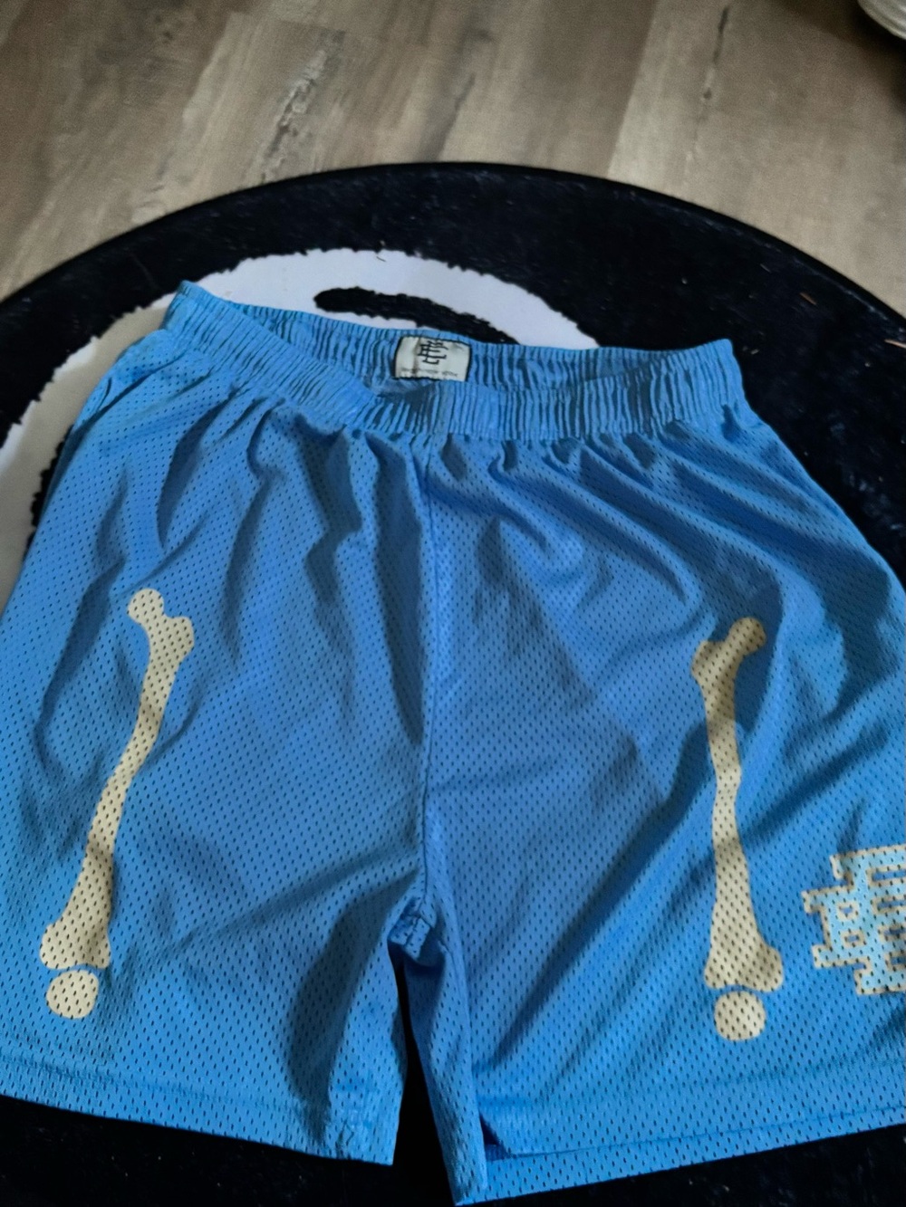 Eric Emanuel Light Blue Mesh Shorts with Cream Bone Graphic